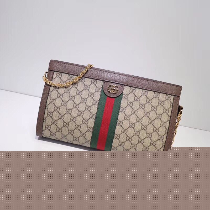 G*u*i clutch bags